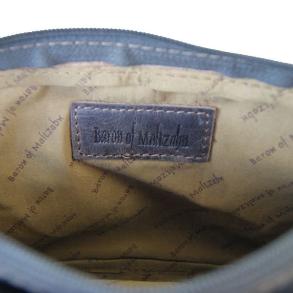 Handgelenktasche SCHLÜTER aus braunem Leder Handgelenktasche SCHLÜTER aus braunem Leder